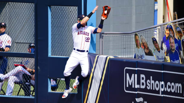 Josh Reddick steals a homer from Matt Olson